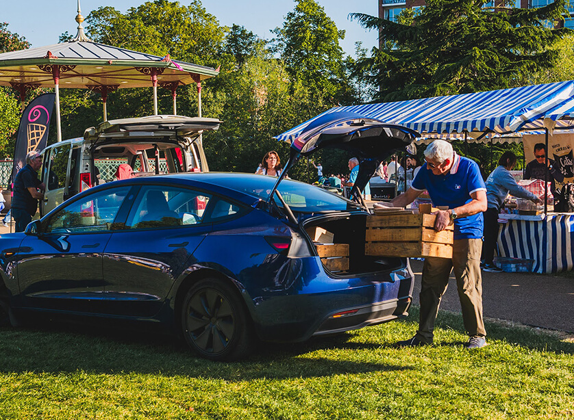 Man placing boxes into his car at a CJ's Events Warwickshire event
